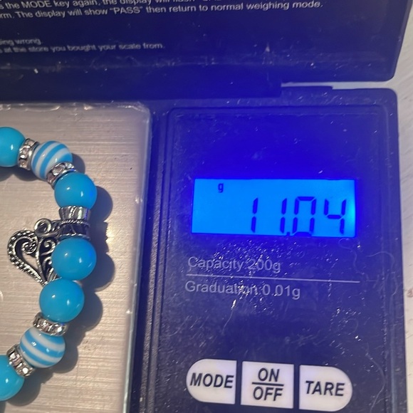 7.5” blue silver stackable stretch bracelets with 4 silver tone pendants - Picture 13 of 13